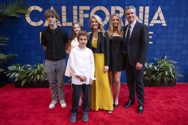 Gov. Gavin Newsom, First Partner Jennifer Siebel Newsom and their children pose on the red carpet before an induction ceremony of the 19th class of California Hall of Fame inductees at the California Museum in Sacramento on Thursday.
